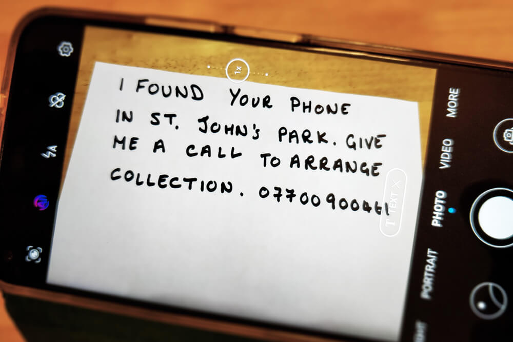 Taking a photo of a message to contact the owner